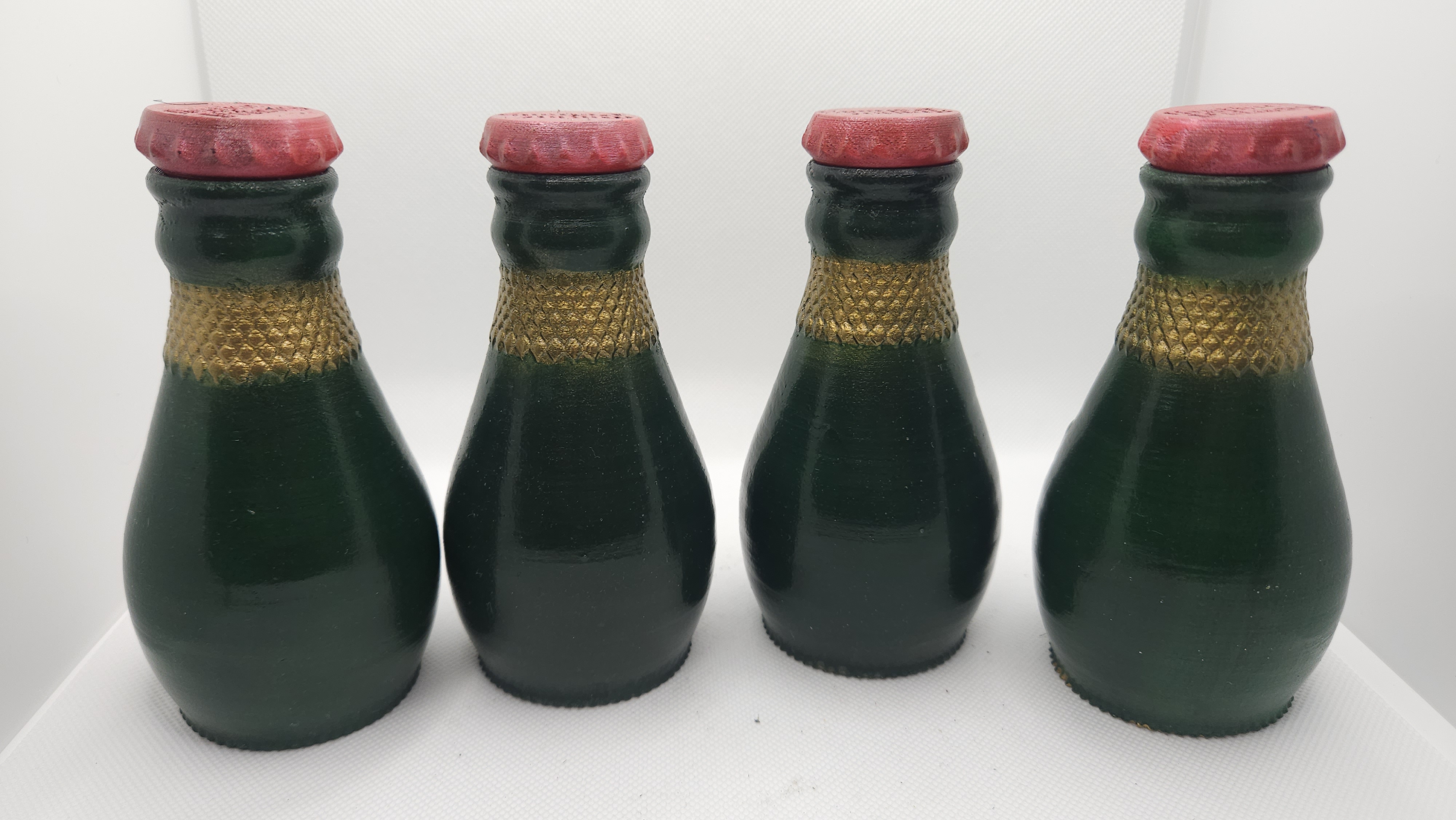 Potion bottles — four green potions lineup
