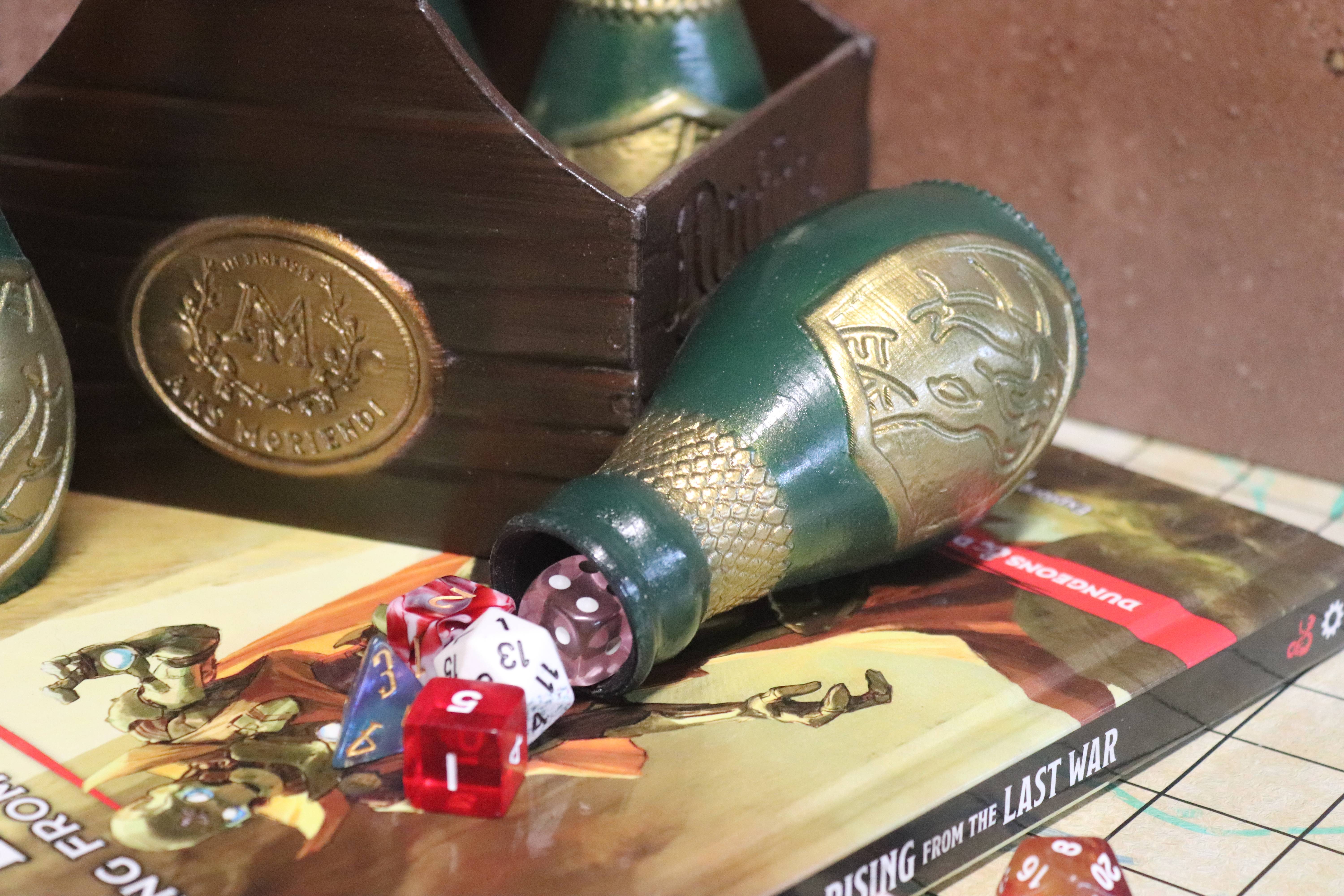 Dragon Cola bottle detail — dragon crest shield and dice spilling out